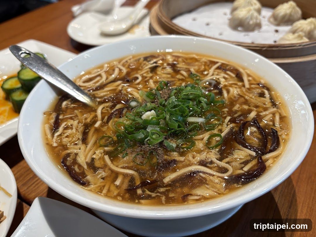 Spicy Tofu Noodle Soup with Dumplings