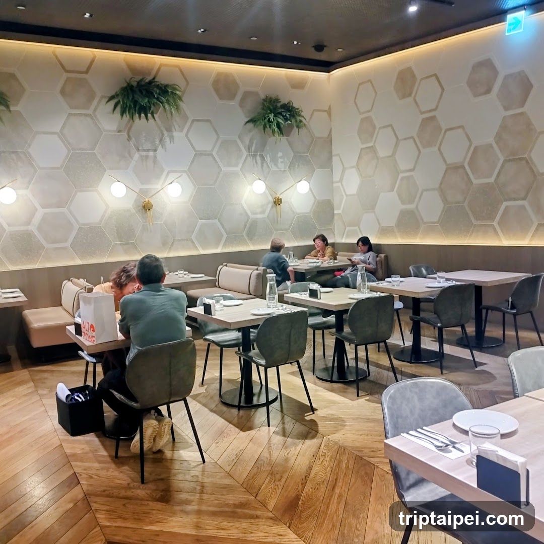 Modern Restaurant Interior with Hexagonal Wall Design