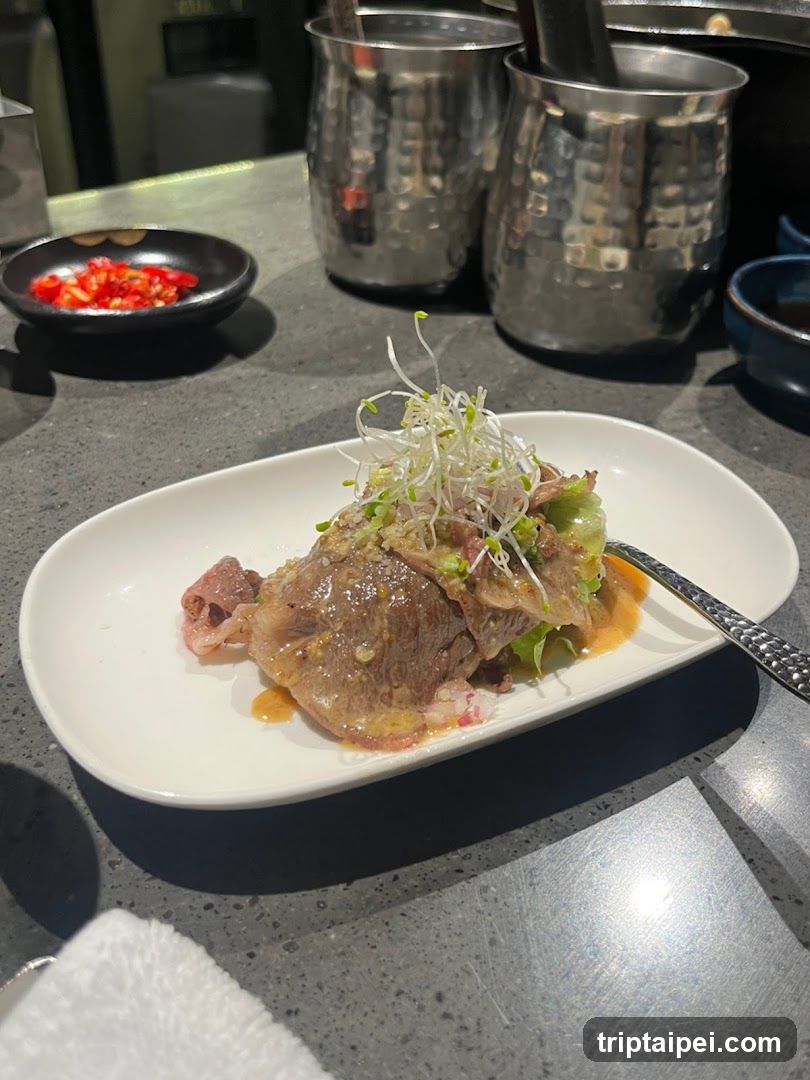 Plated Meat Dish with Sprouts
