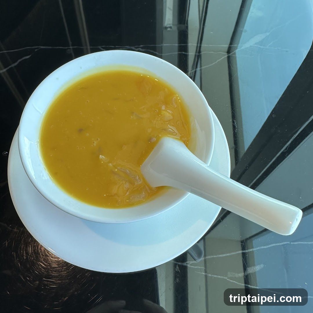 Bowl of Soup with Spoon