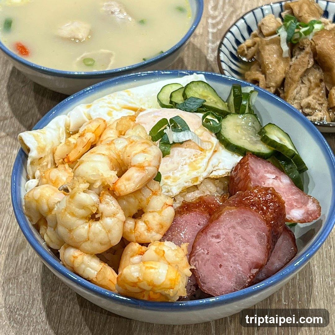 Bowl of Rice with Shrimp, Sausage, and Fried Egg