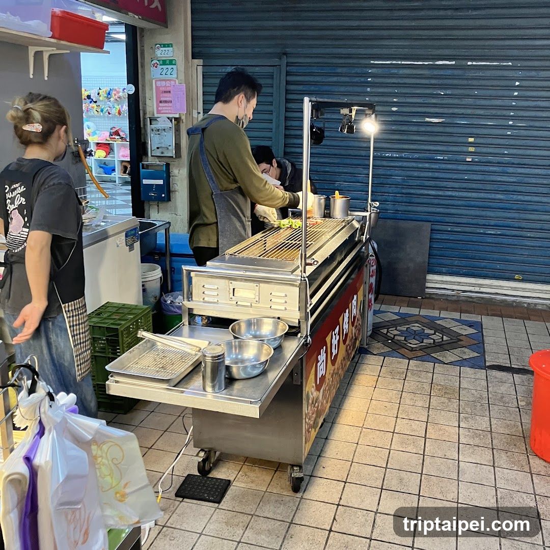 Street Food Stall with Staff Preparing Food