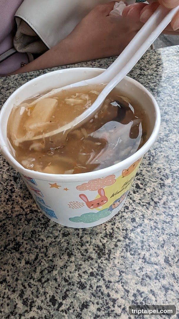 Bowl of Soup with Spoon