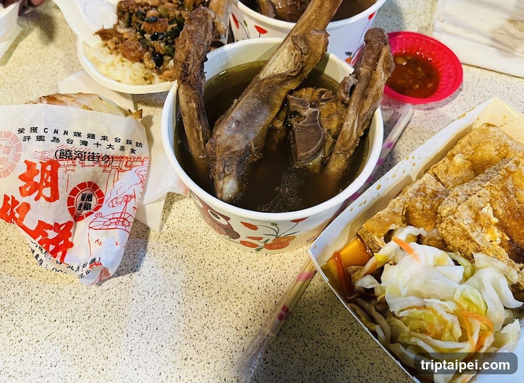 Food spread with soup and fried items