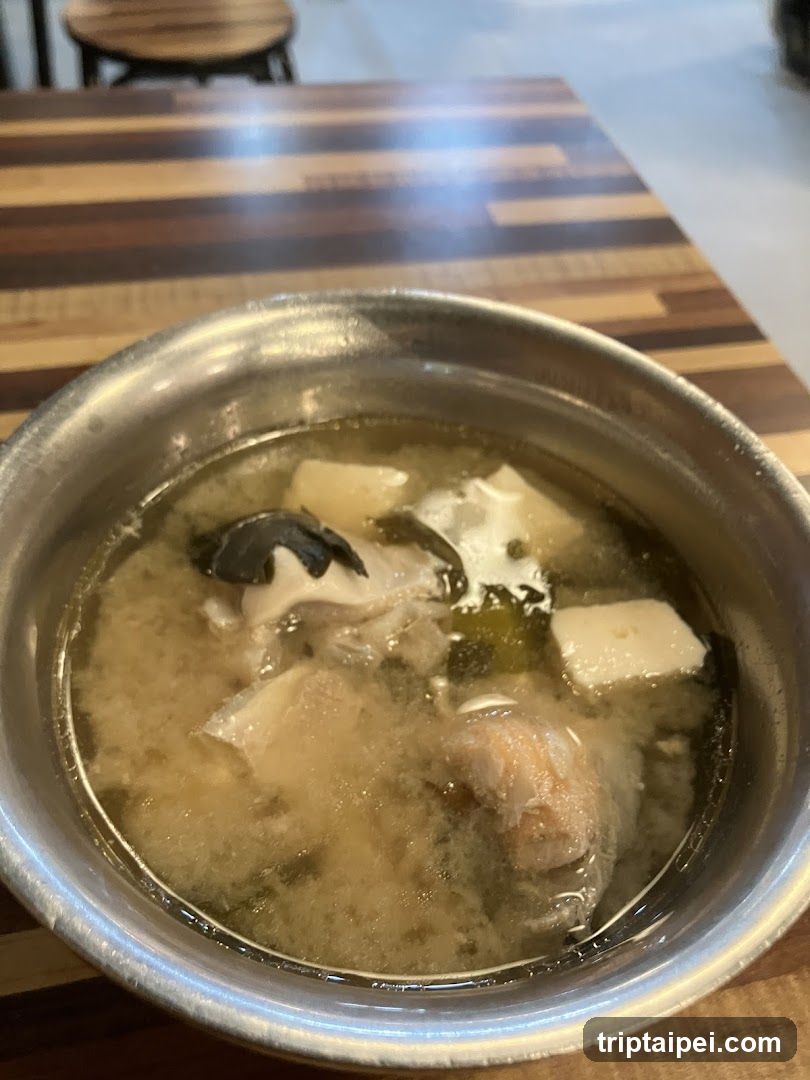 Bowl of Soup with Tofu and Seafood