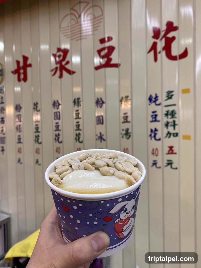 Hand holding soybean flower dessert
