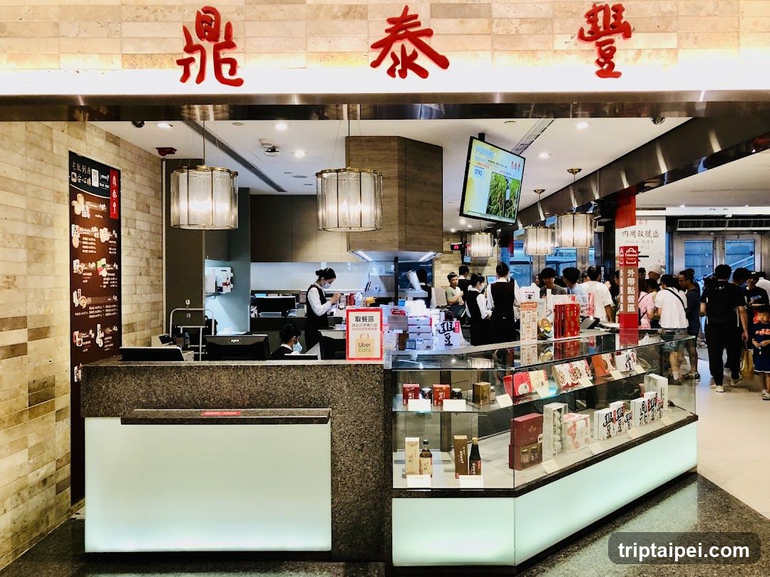 Food stall interior with staff and customers