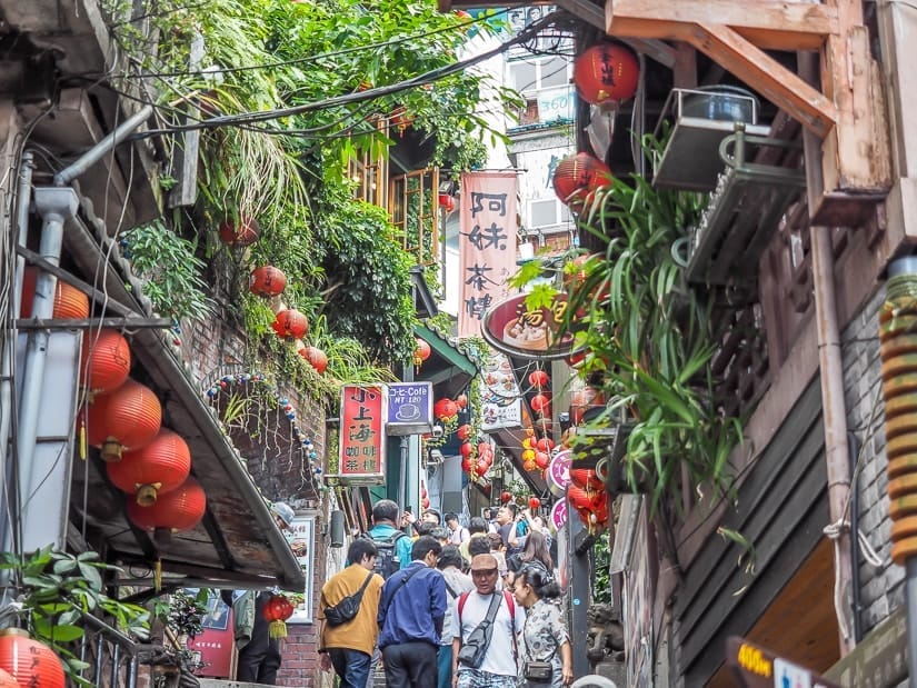 Crowds filling the narrow Jiufen Old Street lined with food stalls