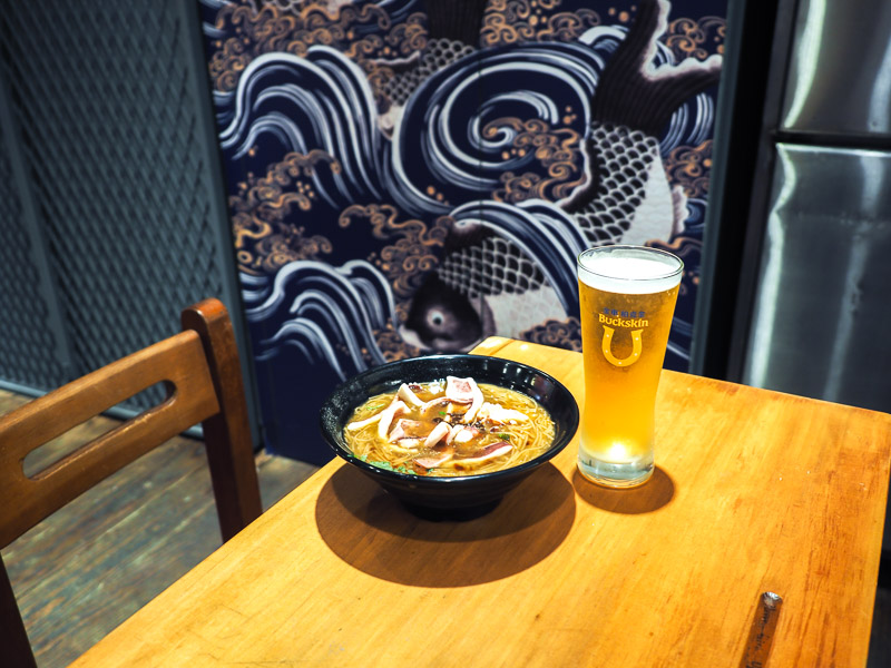 A Hui vermicelli noodles with squid served on an old Taiwanese school desk